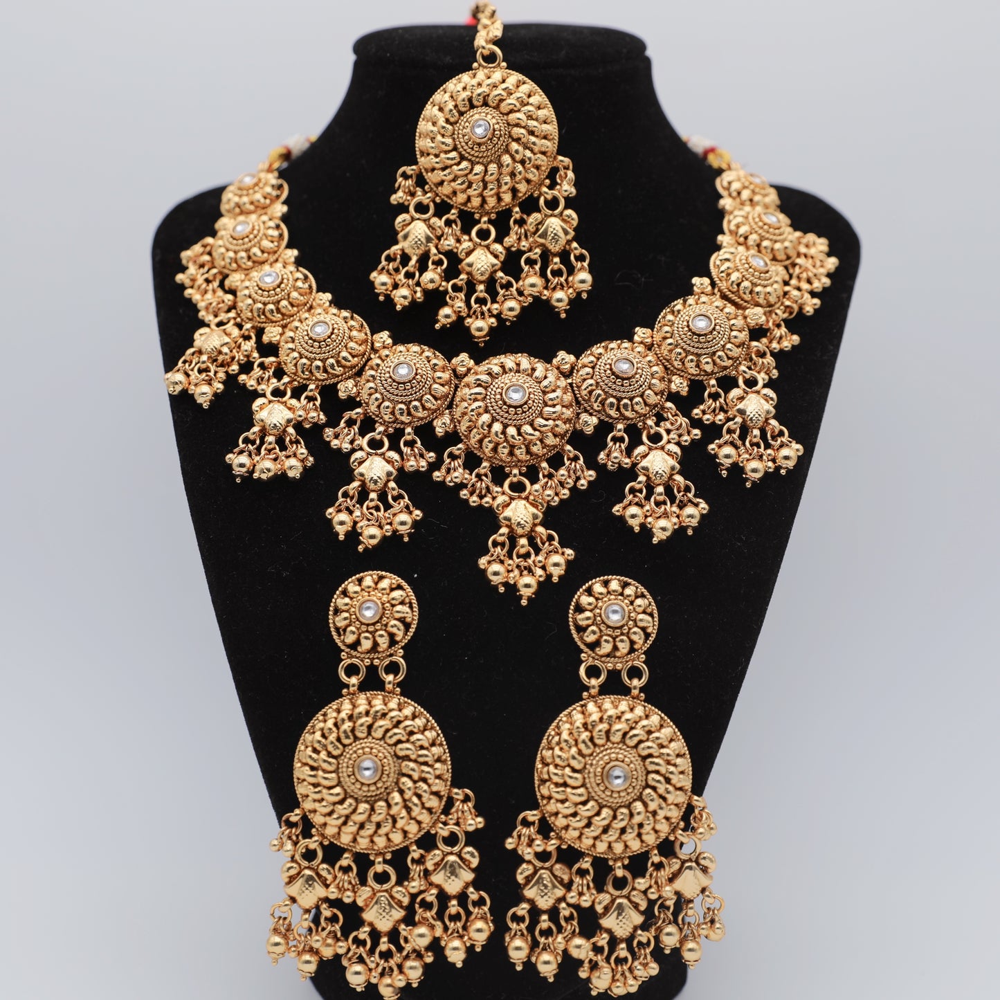 Matte Finish White Necklace Set with Tikka β Necklace, Earrings & Tikka