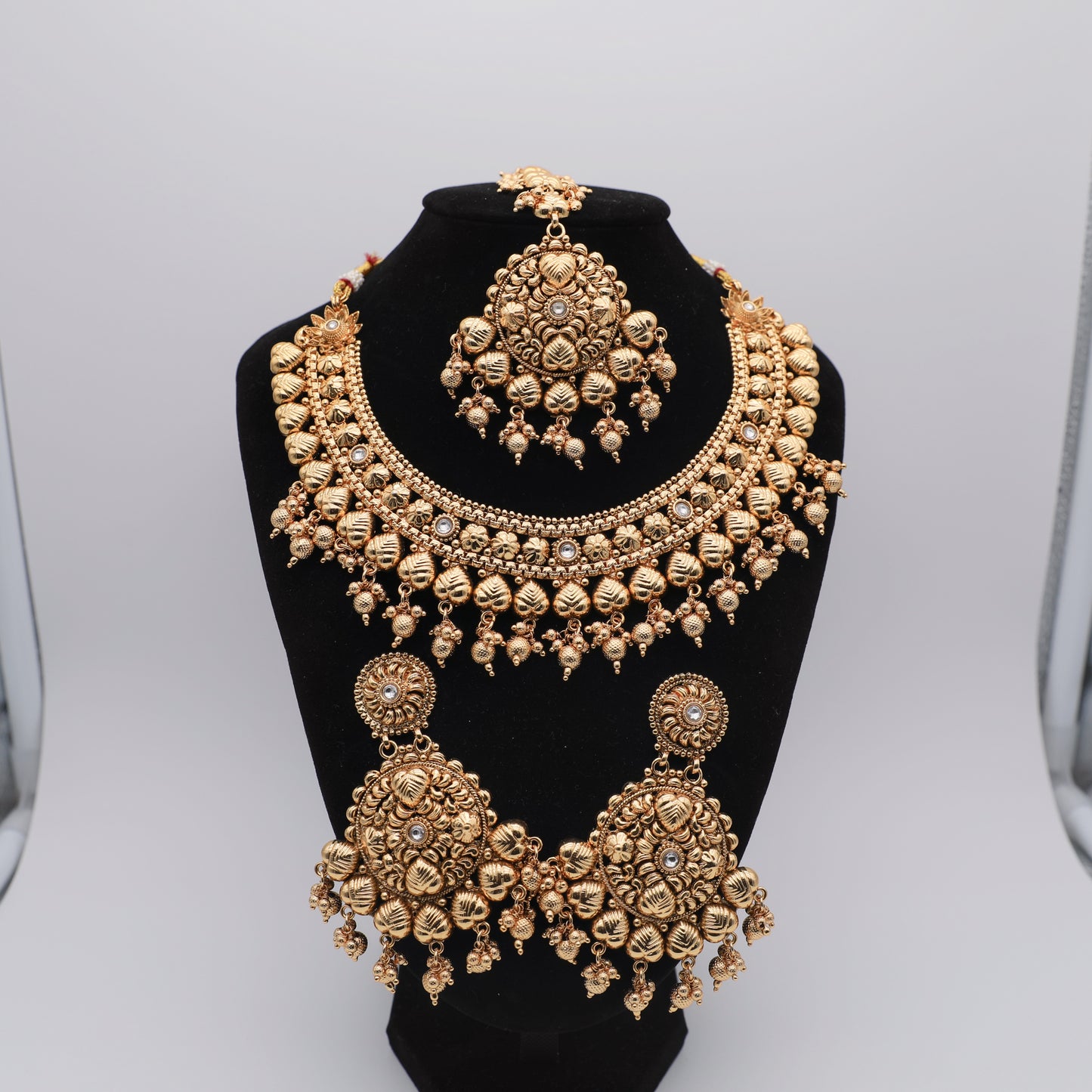 Gold-Plated Necklace Set with Tikka β Necklace, Earrings & Tikka